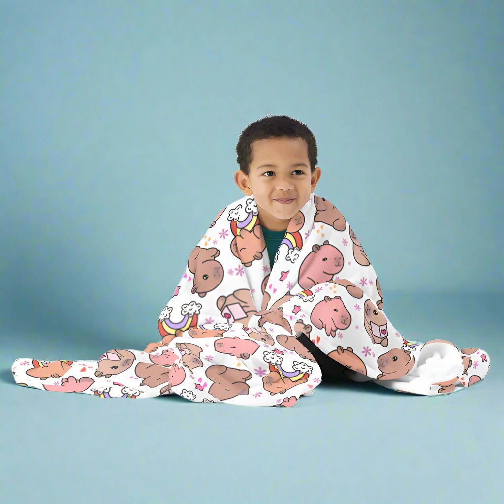 boy with a Cuddly Kawaii Capybara Cozy Velveteen Plush Blanket