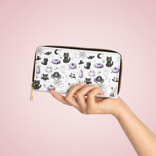 hand holding Cute Halloween Zipper Wallet with Black Cats, Ghosts, Bats and Spiders
