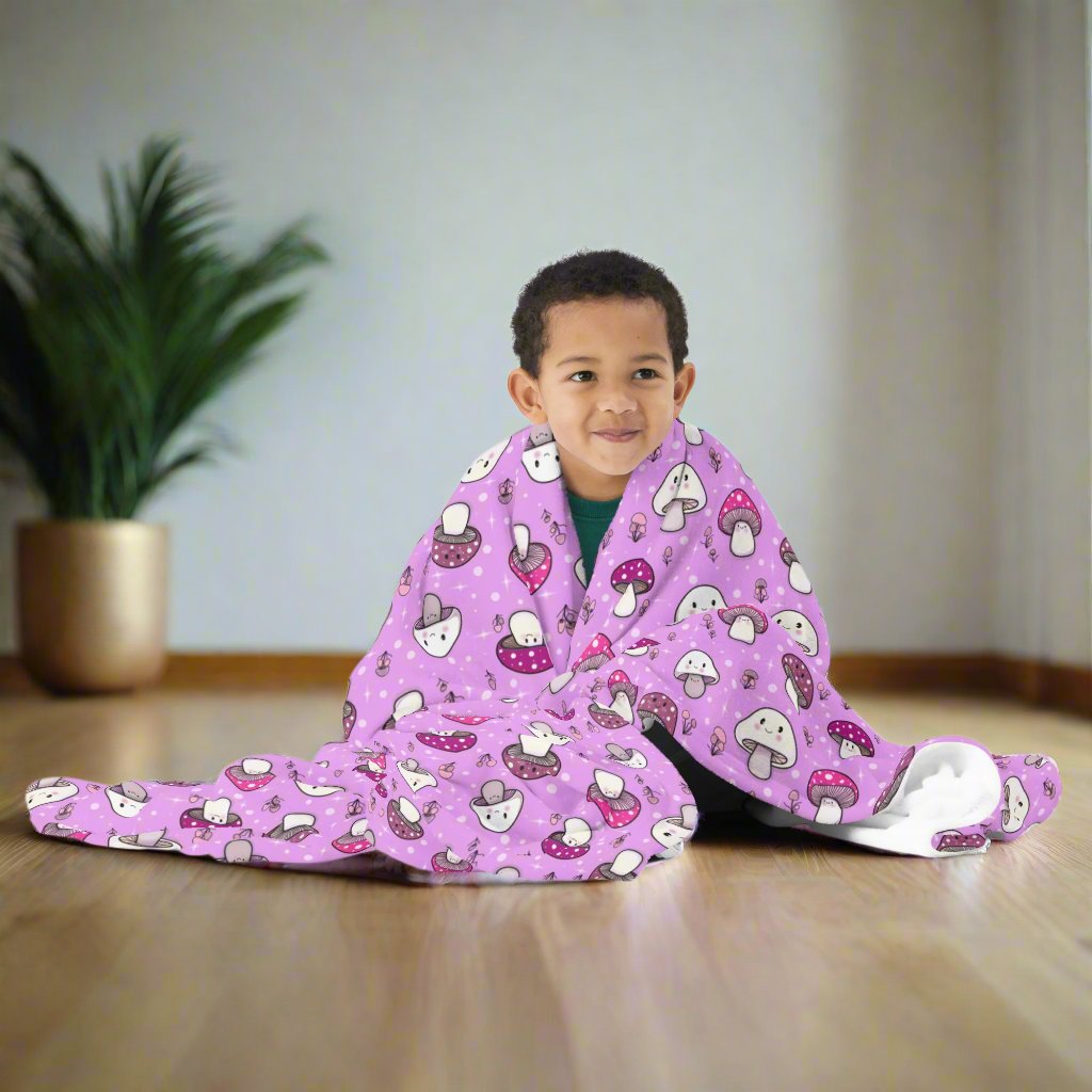 Happy Fungi Cottagecore Cozy Plush Blanket around boy