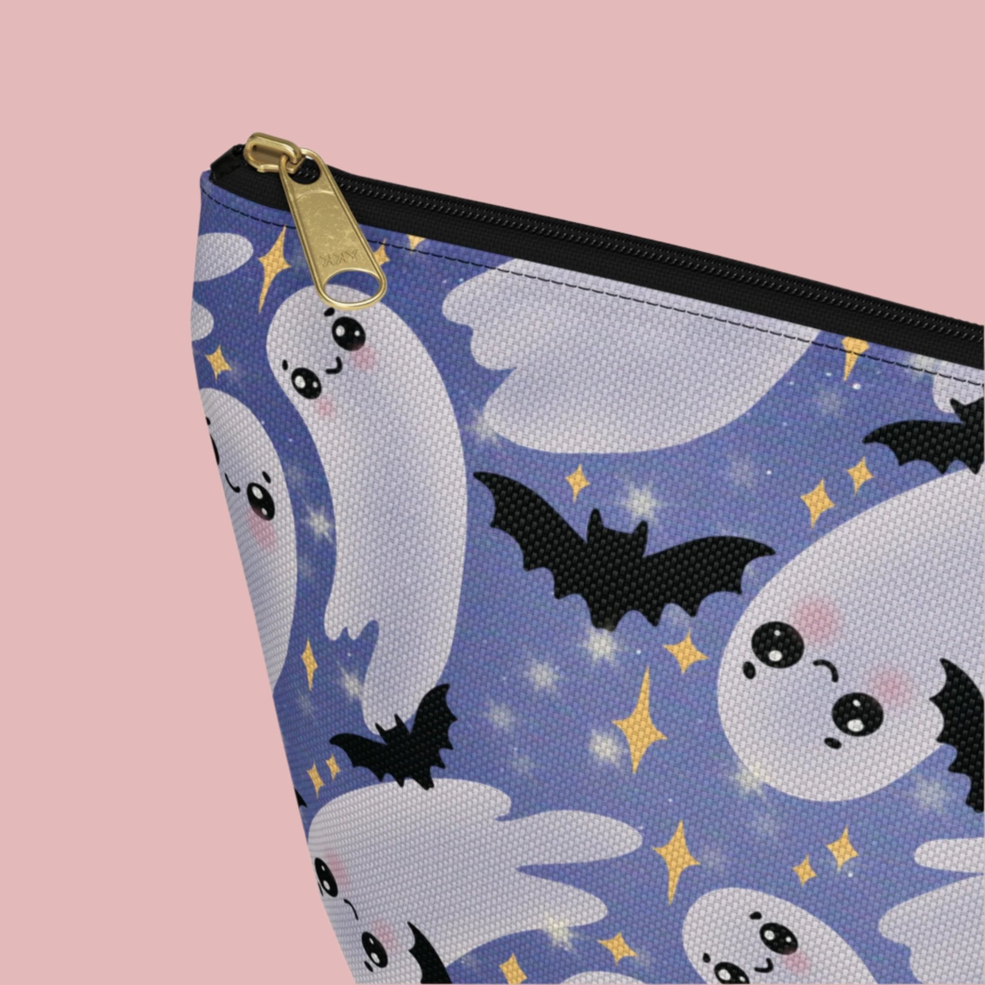Large Blue Accessory Pouch with Cute Twirling Ghosts and Bats detail