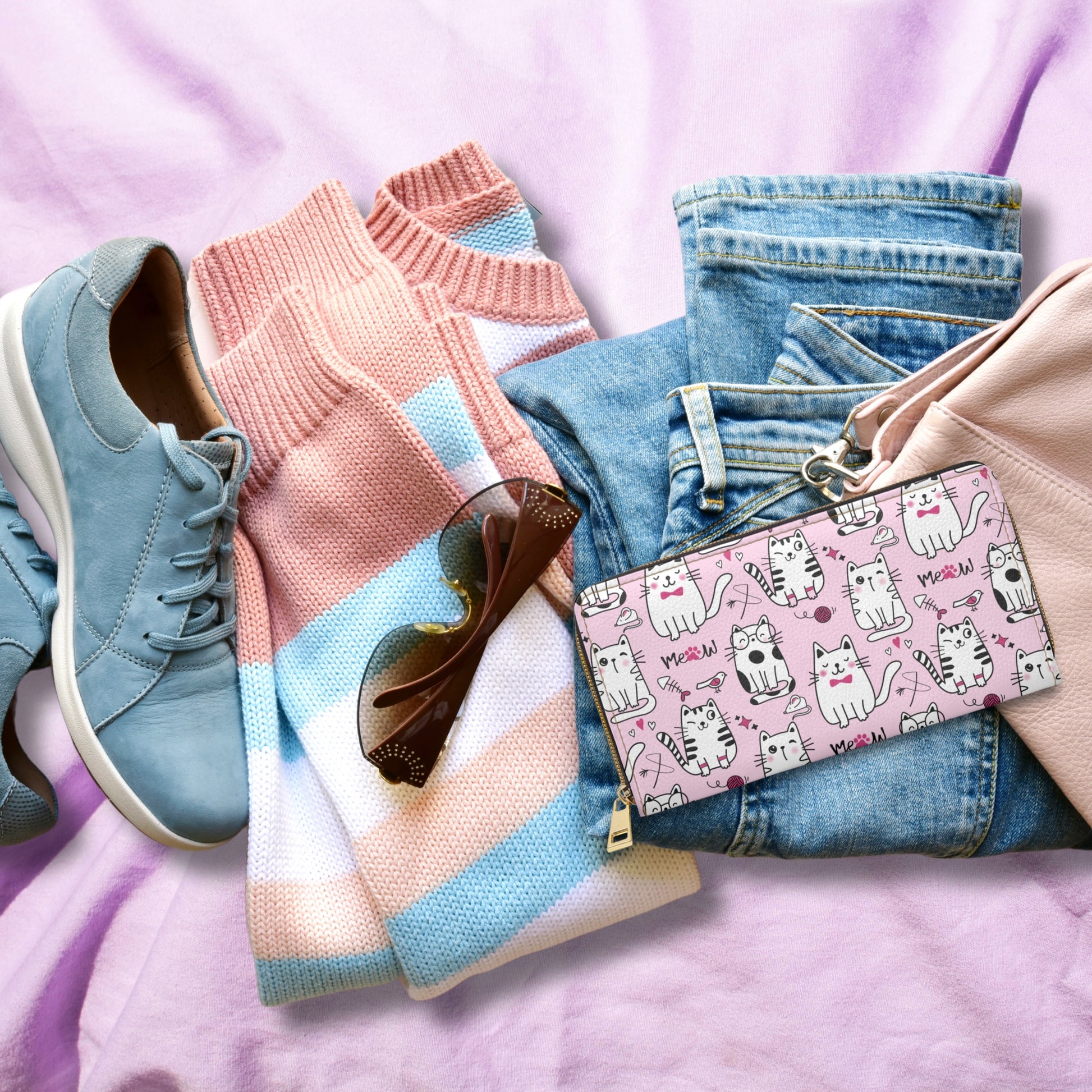 Pink Zipper Wallet with Sassy Cats on bed with clothing items