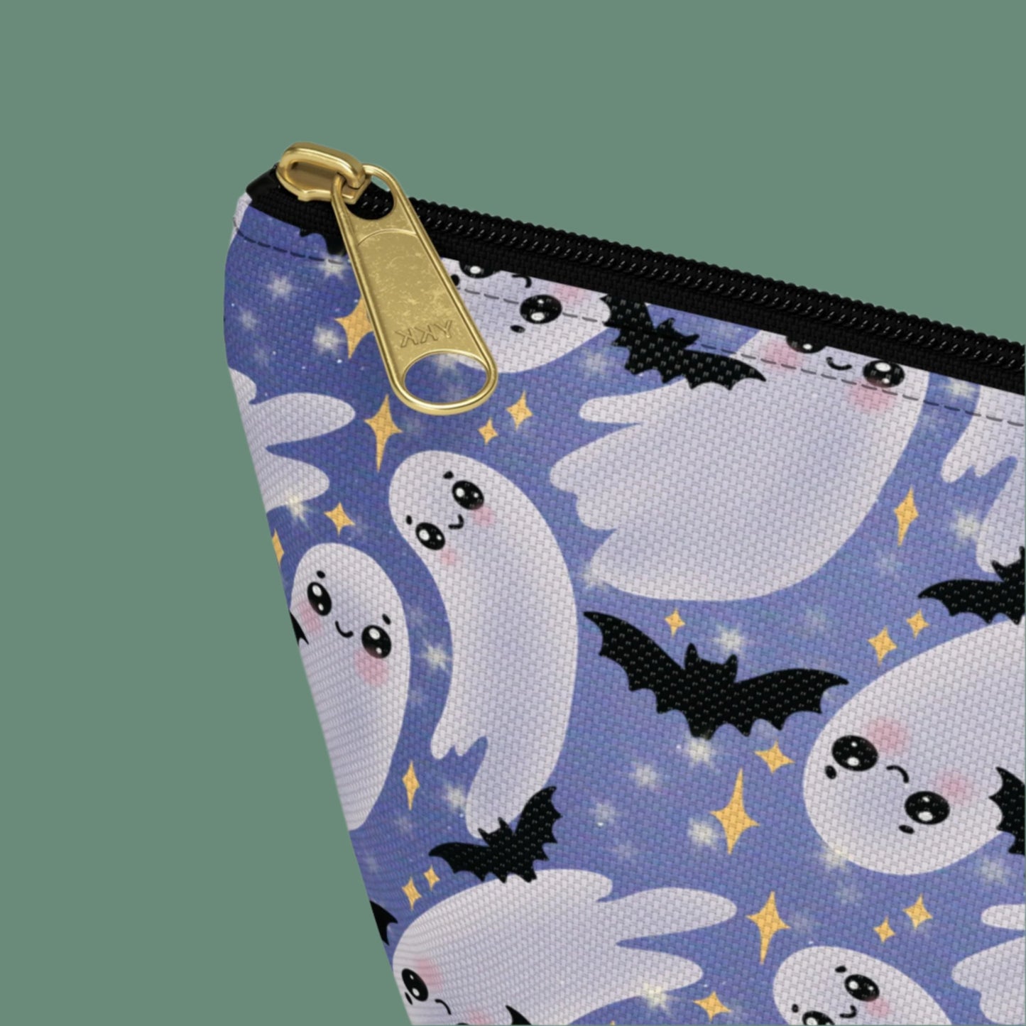 Small Blue Accessory Pouch with Cute Twirling Ghosts and Bats detail