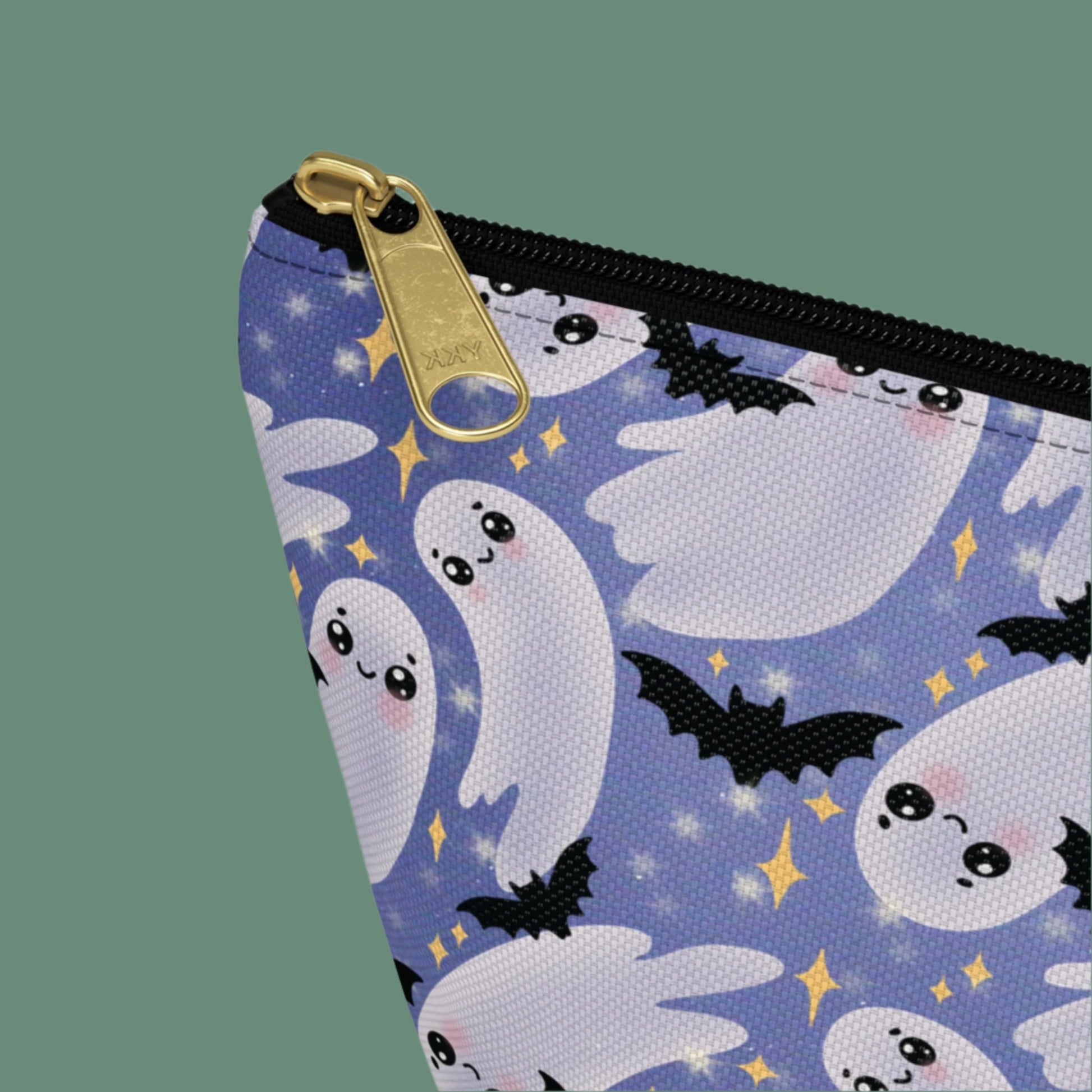 Small Blue Accessory Pouch with Cute Twirling Ghosts and Bats detail