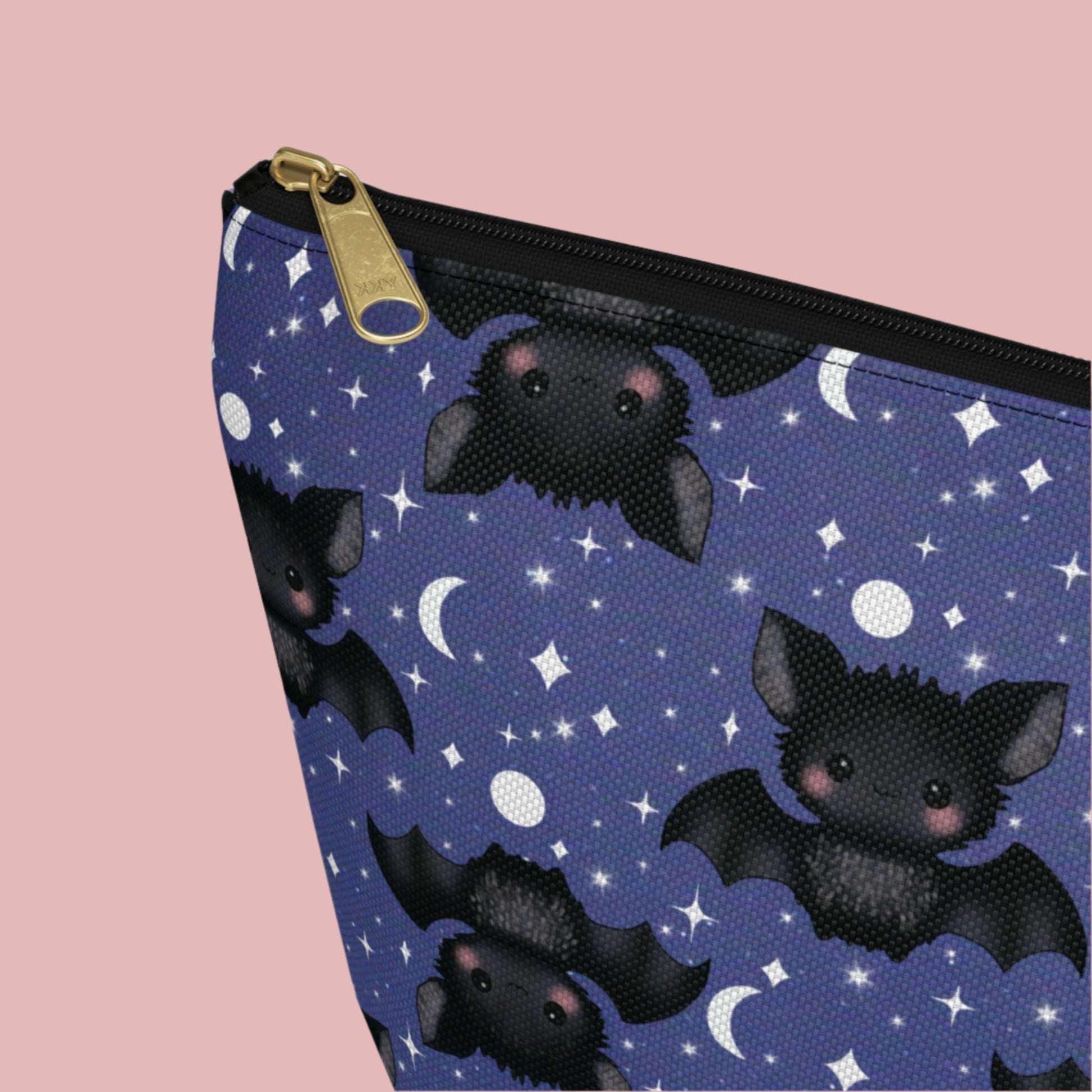 detail of Midnight Blue Accessory Pouch with Cute Bats among Moons & Stars