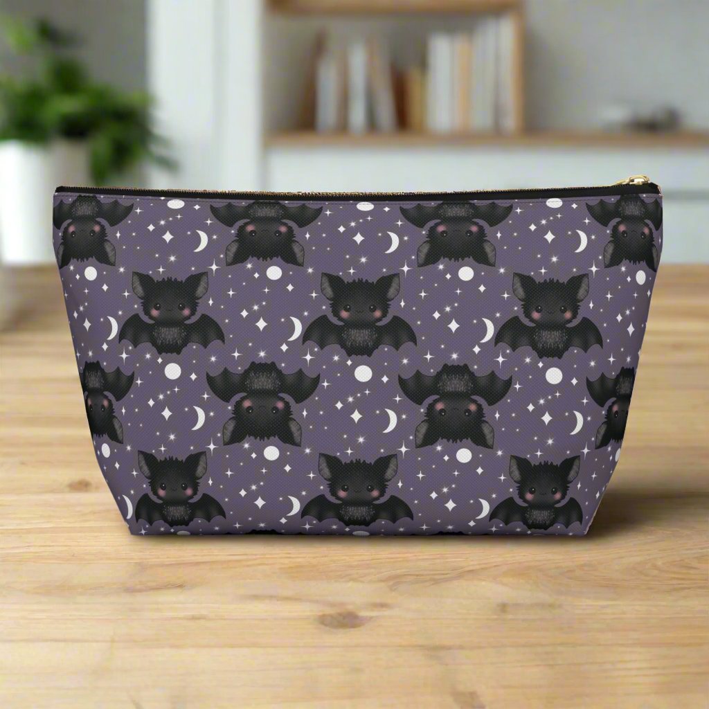large Cute Bats, Moon and Stars Accessory Pouch with T-bottom on wood table in room