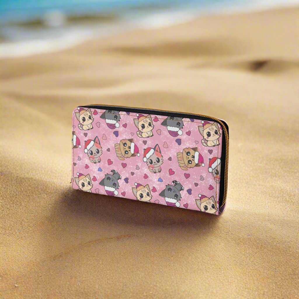 cute pink wallet with a long zipper featuring adorable Christmas kittens and hearts sitting on beach