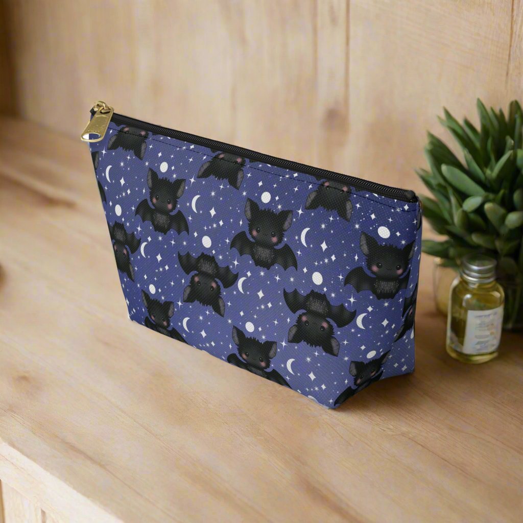 side view small Midnight Blue Accessory Pouch with Cute Bats among Moons & Stars