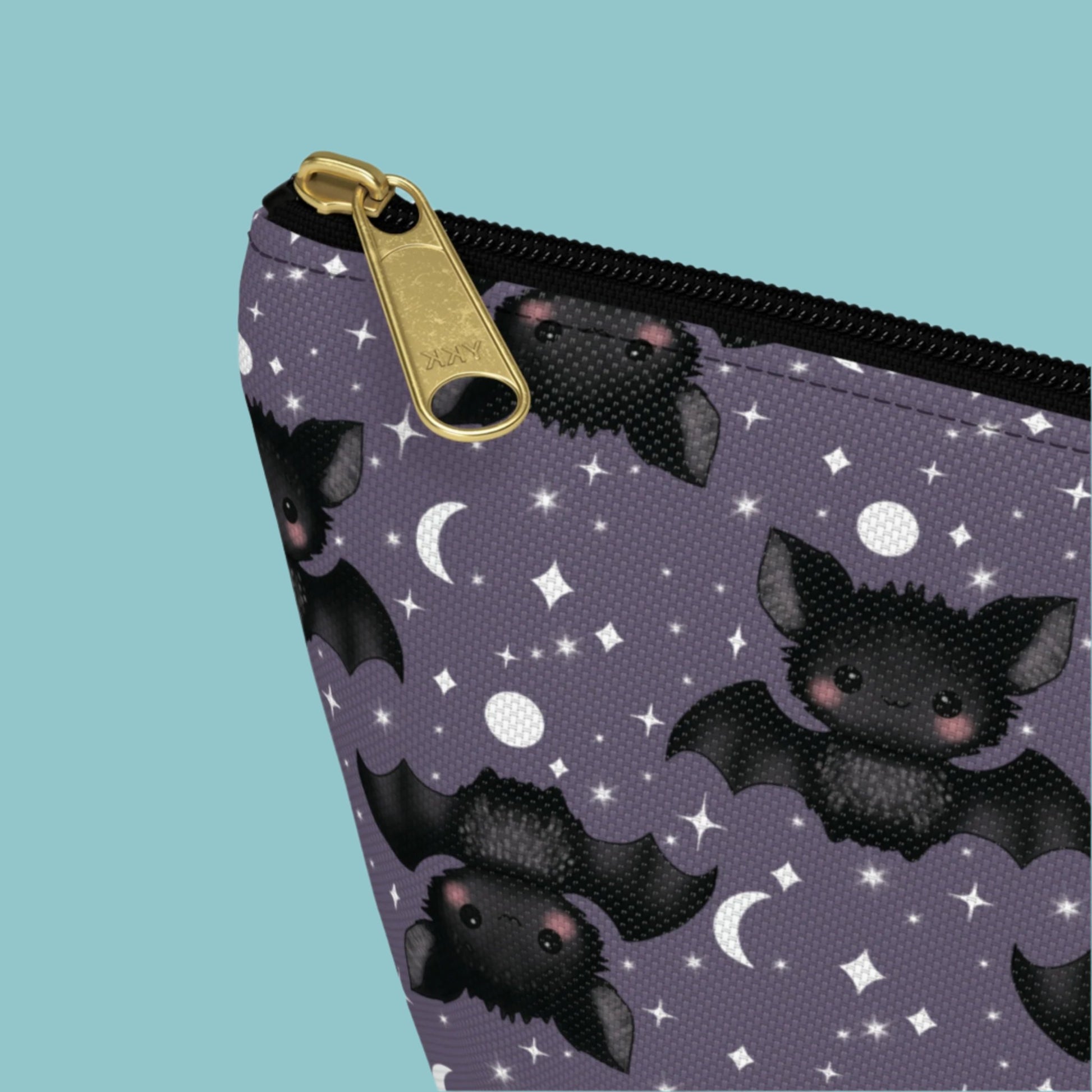zipper close up detail of small Cute Bats, Moon and Stars Accessory Pouch with T-bottom